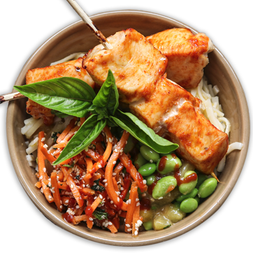 Noodle bowl with chicken skewers